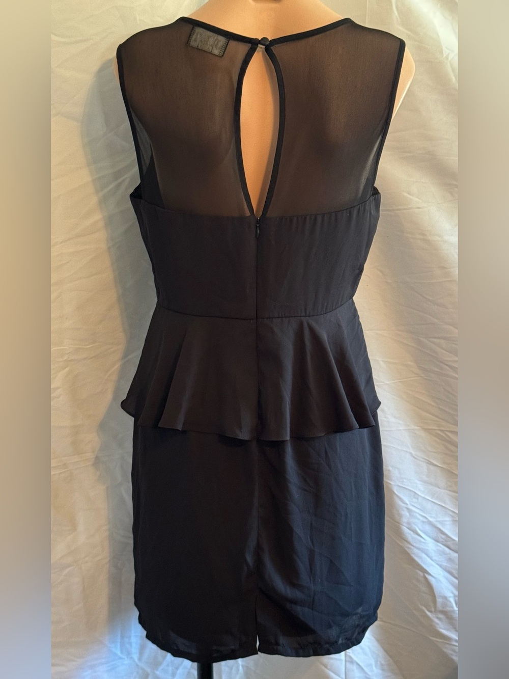 Chic Black Peplum Sleeveless Dress with Sheer Yoke - Picture 2 of 3